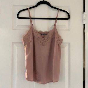 Blush camisole with lace detail.